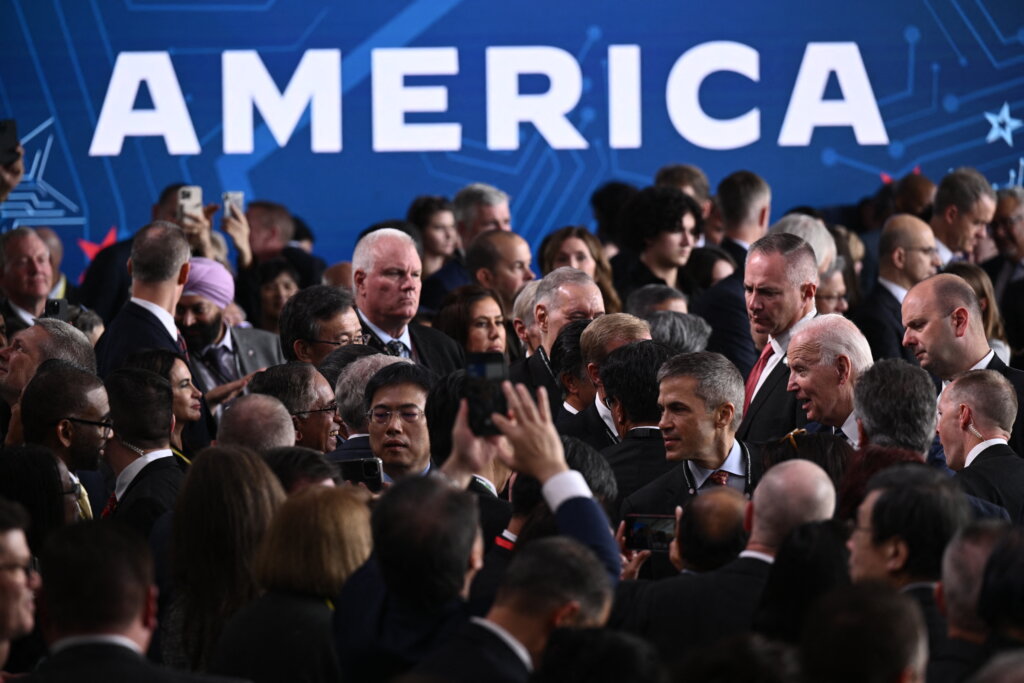 US President Joe Biden greets attendees after delivering remarks on his economic plan at a TSMC chip manufacturing facility in Phoenix, Arizona, on December 6, 2022. (Photo by Brendan SMIALOWSKI/AFP).