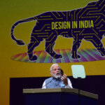 Does India have what it takes to be a semiconductor superpower? Photo: Indian Prime Minister Narendra Modi speaks during SemiconIndia 2023, at Mahatma Mandir in Gandhinagar on July 28, 2023. (Photo by SAM PANTHAKY / AFP)