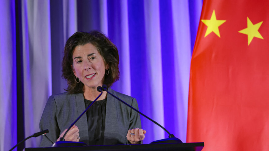 Raimondo warns against unwanted access to US cloud technology while acts to block use of US tech for AI by China due to security concerns. (Photo by CARLOS BARRIA/POOL/AFP).