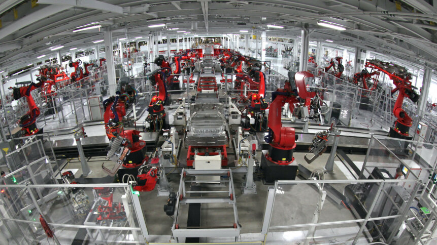 AI and the future of work, epitomized by the Tesla production line.