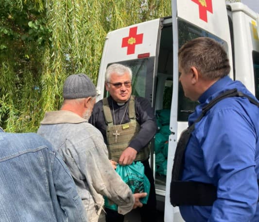 Escaping gunfire, pope’s top charity official declares mass graves in Ukraine ‘real’