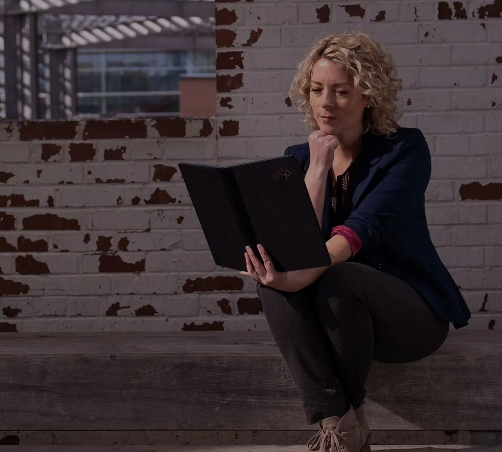 Folding screen laptop being read like a book.